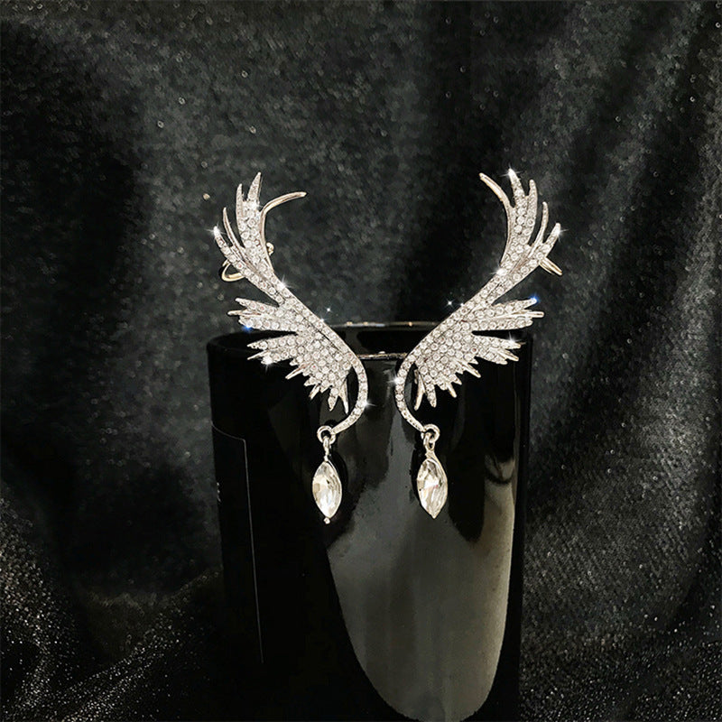 Boucles d’Oreilles Ailes Cristal – Éclat Céleste & Pampilles