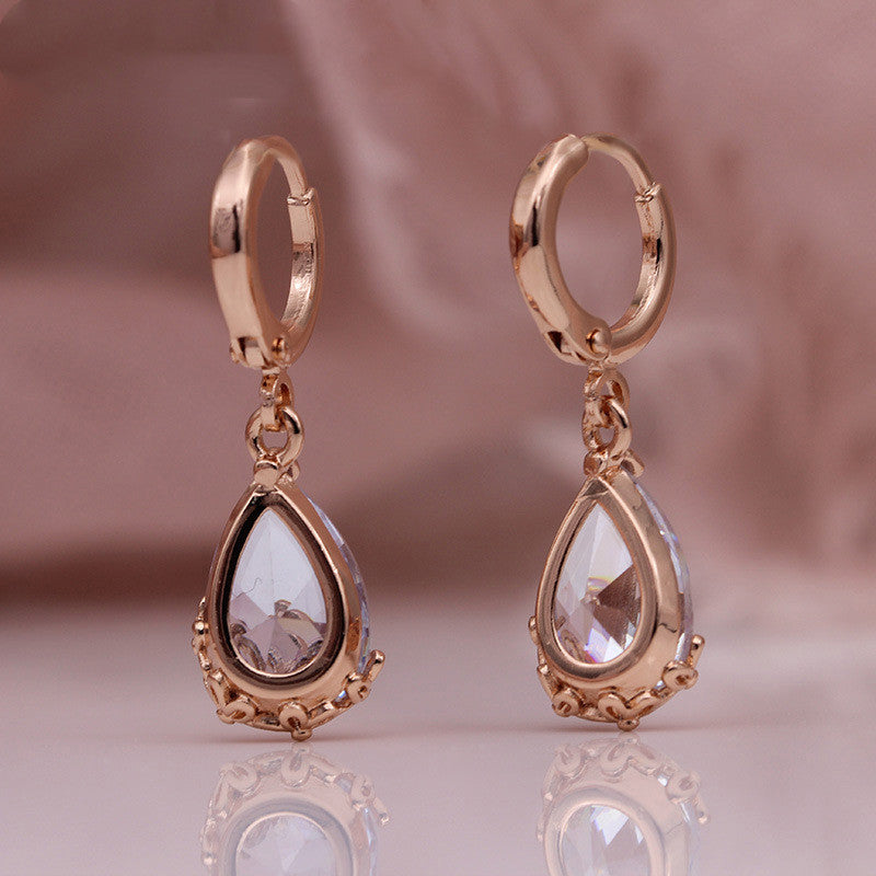 Eclat Rosé – Boucles d’Oreilles Géométriques
