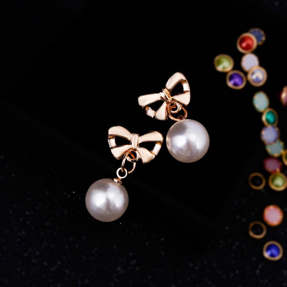 Boucles d'Oreilles Cœur & Nœud Papillon – Zircon et Perle Synthétique